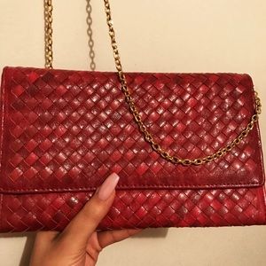 Red woven clutch